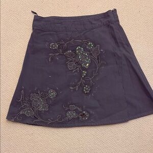 Manila, Grace embroidered faux wrap Mini Skirt